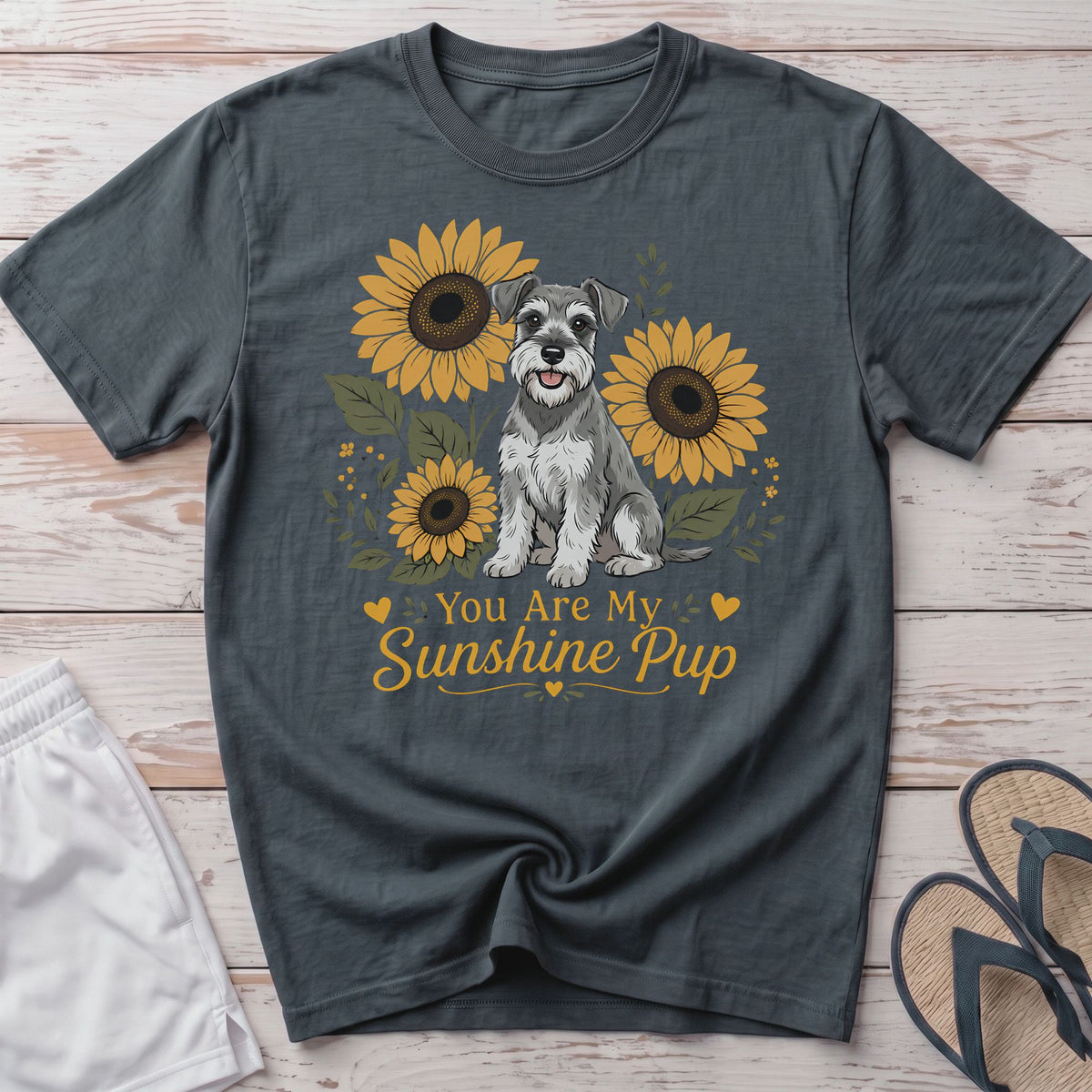 Schnauzer dog sitting among sunflowers with text "You Are My Sunshine Pup".