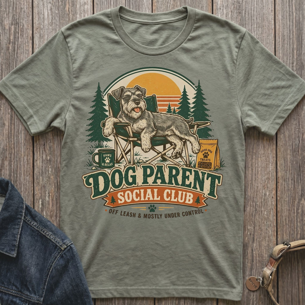 Gray t-shirt with "Dog Parent Social Club" graphic featuring a schnauzer relaxing.