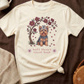Cream t-shirt with Yorkshire Terrier under cherry blossoms and text "Soft Heart Loyal Soul".