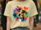 Dog portrait with colorful paint splatters and paw print on a light yellow t-shirt.