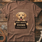Brown t-shirt featuring a mugshot of a happy dog holding a "Most Wanted Zoomie" sign.