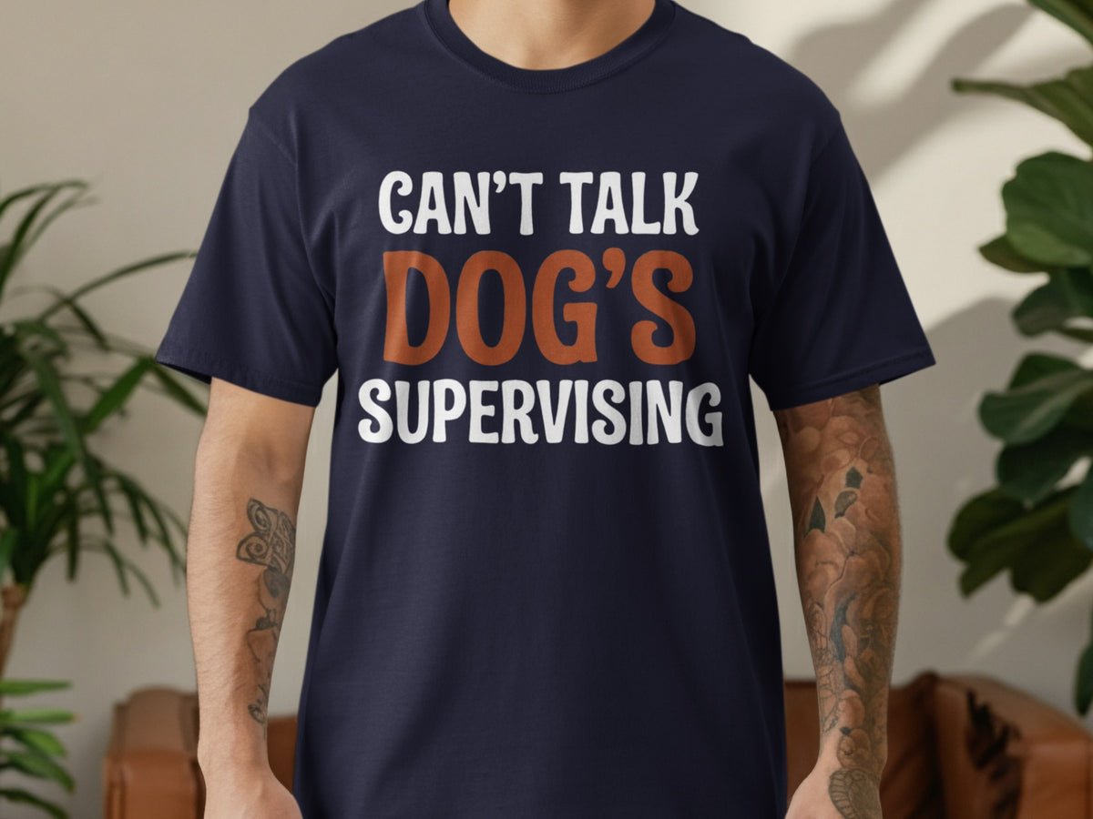 Dark blue t-shirt with text "CAN'T TALK DOG'S SUPERVISING".