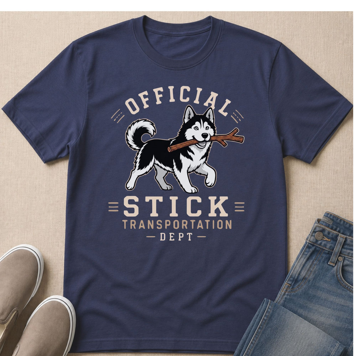 Navy t-shirt with a husky carrying a stick and text reading "Official Stick Transportation Dept."
