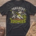 Husky running with stick and bandana text "Trailhead Zoomies" on dark t-shirt.