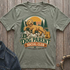 T-shirt with illustration of a dog sitting in a chair with text "Dog Parent Social Club."