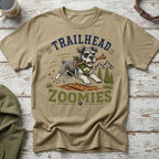 T-shirt with graphic of a schnauzer running with a stick, "TRAILHEAD ZOOMIES" text.