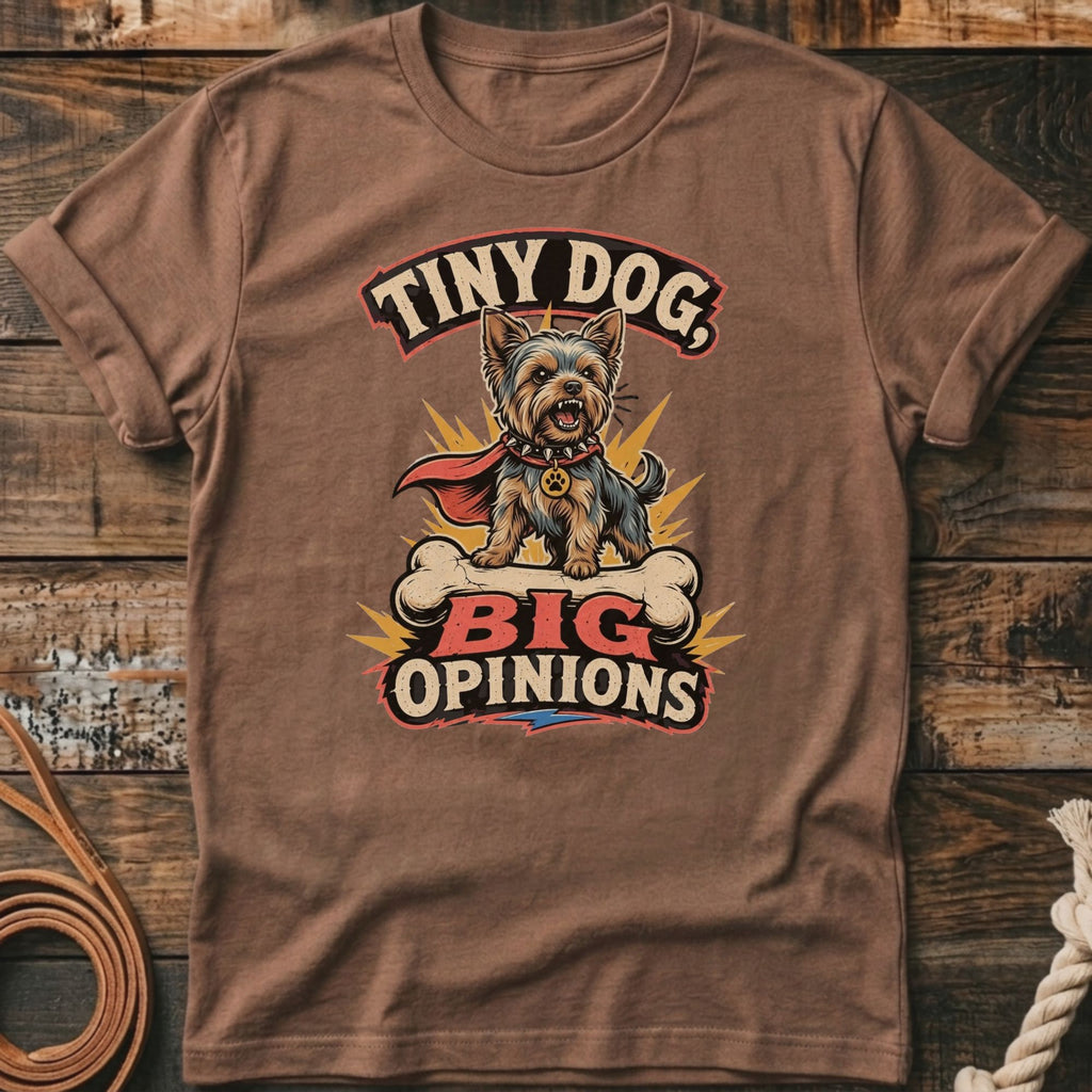 Yorkshire terrier with cape on bone, text "Tiny Dog, Big Opinions".