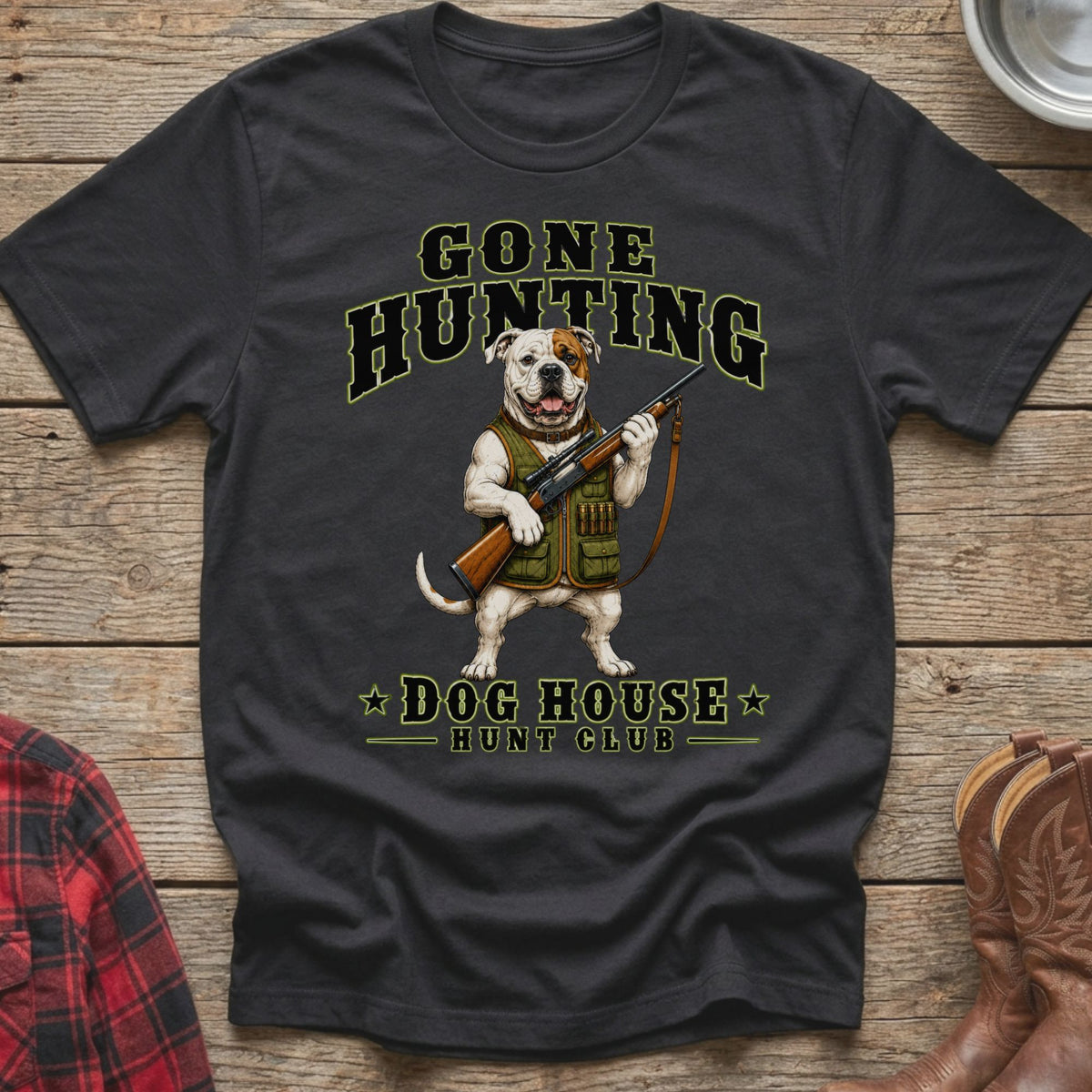 T-shirt with a bulldog wearing a hunting vest holding a rifle, text says "GONE HUNTING DOG HOUSE HUNT CLUB".