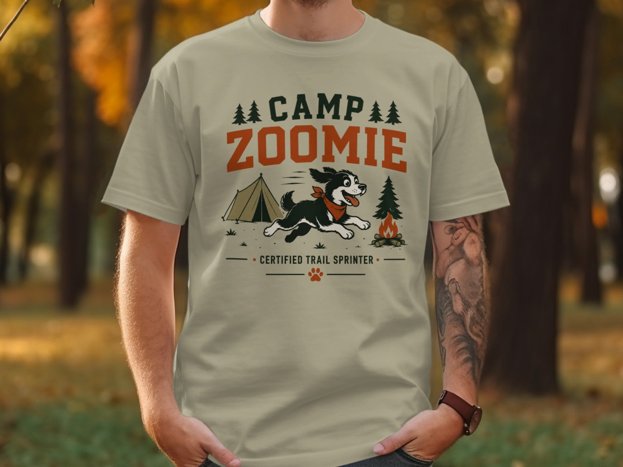 T-shirt with "CAMP ZOOMIE CERTIFIED TRAIL SPRINTER" text and cartoon dog graphic.