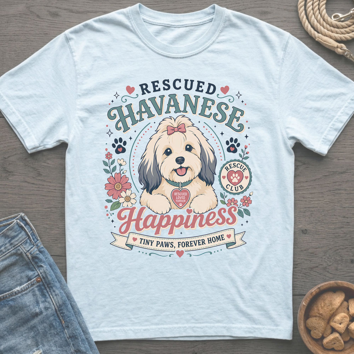 Rescued Havanese Happiness t-shirt with a cute dog, flowers, and rescue club emblem.