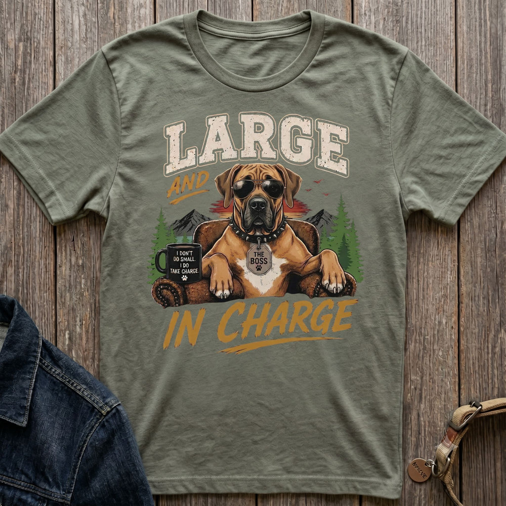 Green t-shirt with illustration of a dog wearing sunglasses and collar, text "LARGE AND IN CHARGE".
