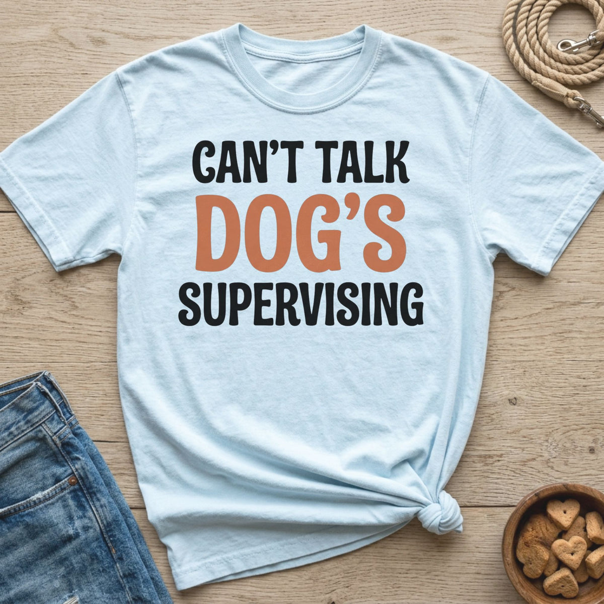 Light blue t-shirt with black text reading "CAN'T TALK DOG'S SUPERVISING".