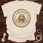 Cream t-shirt with a poodle and text "I RESCUED MY BEST FRIEND" graphic.