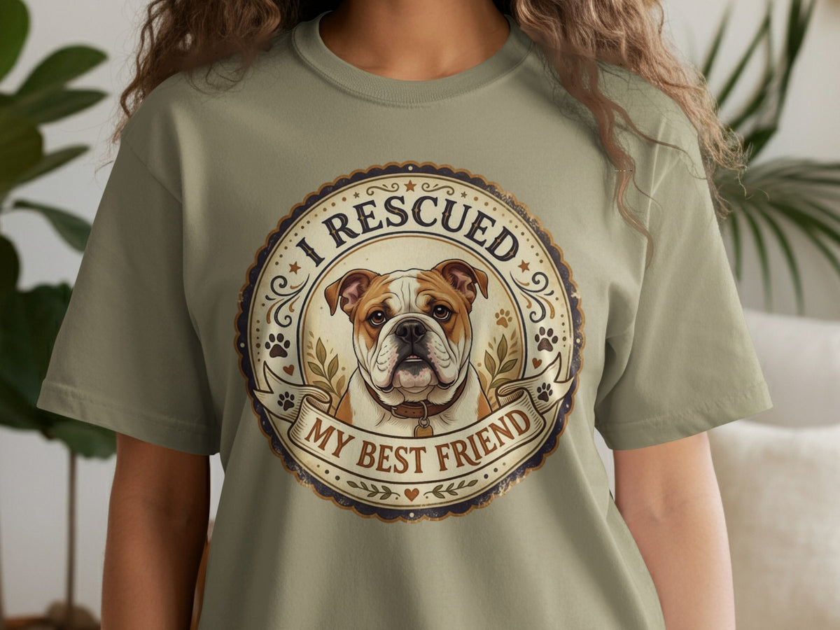 Bulldog wearing a collar on a t-shirt with text "I RESCUED MY BEST FRIEND".