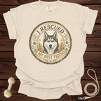 Cream t-shirt with a husky graphic that says "I RESCUED MY BEST FRIEND".