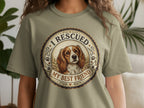 T-shirt with a dog portrait and "I RESCUED MY BEST FRIEND" text.