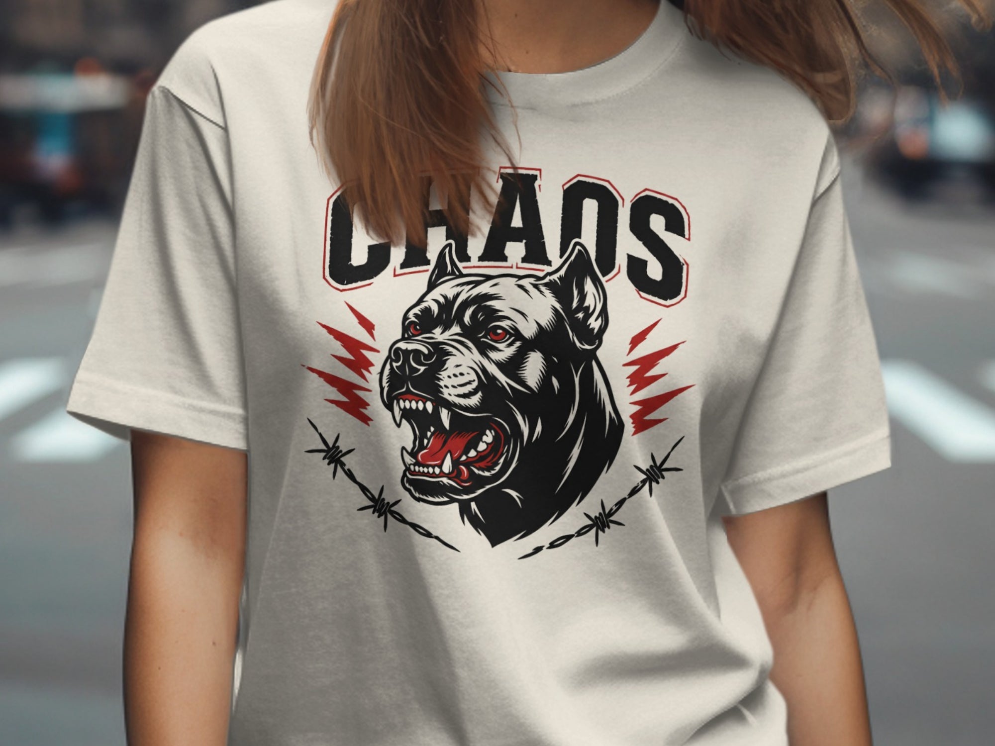 White t-shirt with black dog head graphic, red accents, and "CHAOS" text.