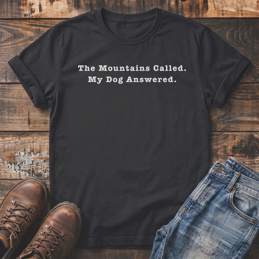 Dark t-shirt with white text "The Mountains Called. My Dog Answered."