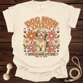 Cream t-shirt with "Dog Mom Energy" text, a dog, and flowers graphic.