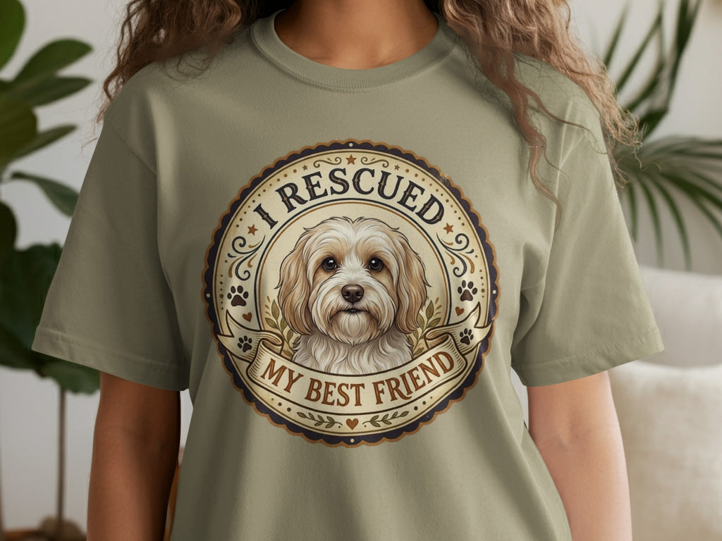 Dog portrait with "I rescued my best friend" text on a t-shirt.