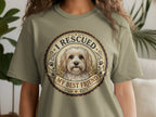 Dog portrait with "I rescued my best friend" text on a t-shirt.