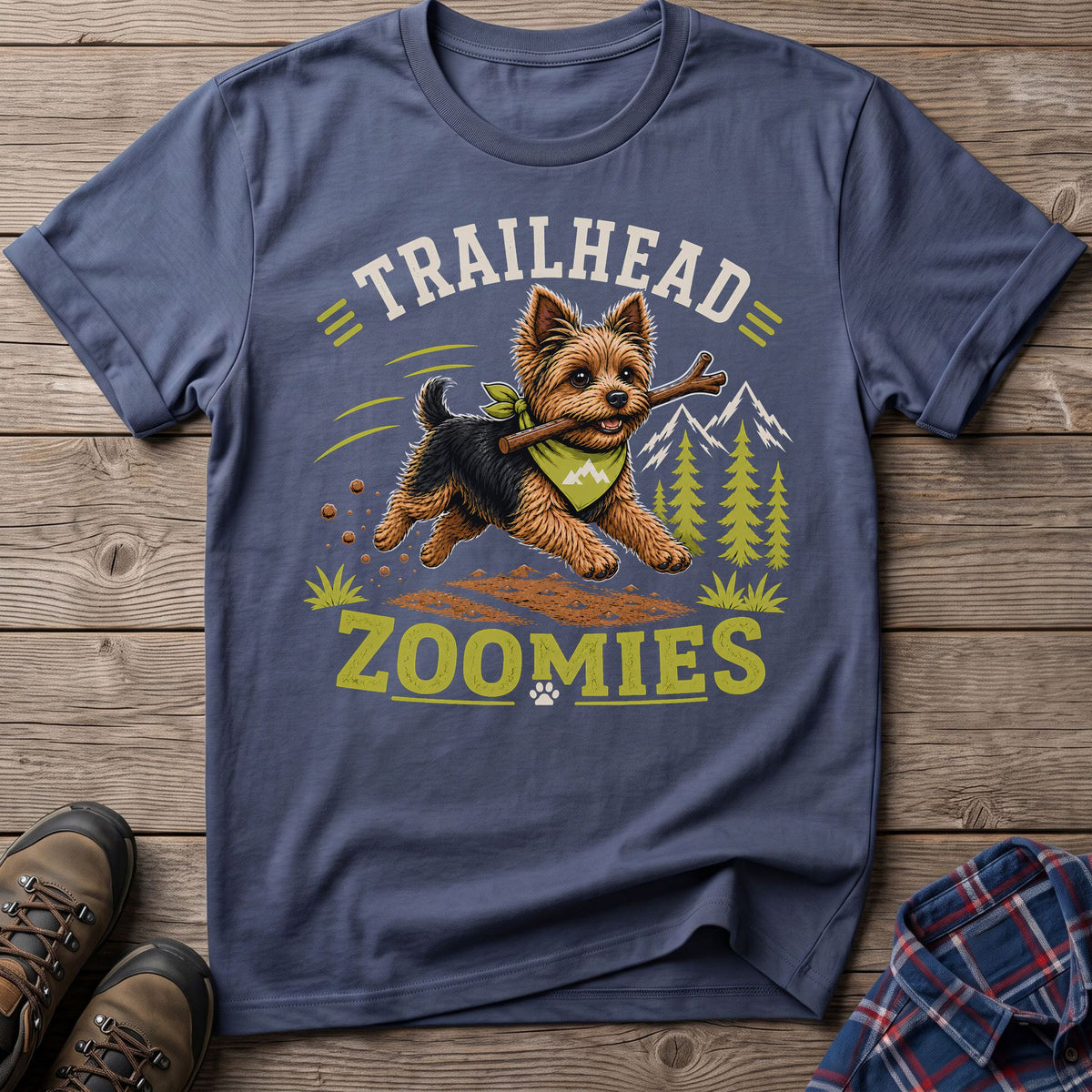 Yorkshire terrier with stick and bandana on shirt with text "Trailhead Zoomies."