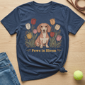 Navy t-shirt with a dachshund in flowers graphic and "Paws in Bloom" text.