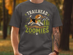 Beagle with stick on t-shirt reading "Trailhead Zoomies".