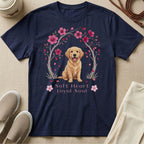 Navy t-shirt with a happy golden retriever sitting under a cherry blossom tree.