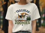 Beagle running with stick, "Trailhead Zoomies" text, mountains, and trees graphic.