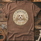 Brown t-shirt with a circular graphic of a dog and text "I RESCUED MY BEST FRIEND".
