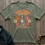 Green t-shirt with graphic of a Dalmatian, flowers, and text "Dog Mom Energy Spoiled Dogs Live Here".
