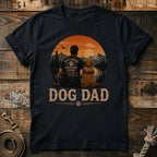 Black t-shirt with graphic of man and dog watching sunset, reading "DOG DAD".