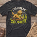 T-shirt graphic with a dog running with a stick and the text "TRAILHEAD ZOOMIES."
