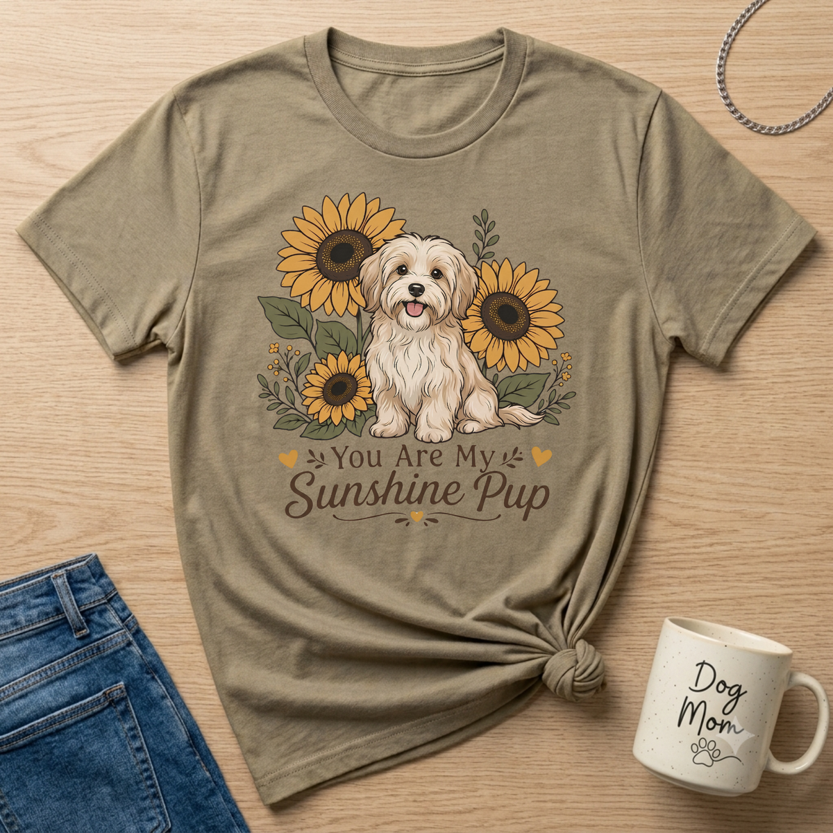 T-shirt with a beige fluffy dog and sunflowers, text "You Are My Sunshine Pup."