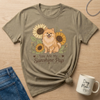 Pomeranian dog with sunflowers on t-shirt with text "You Are My Sunshine Pup".