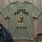 Green t-shirt with a Dalmatian holding a rifle, text reads "GONE HUNTING DOG HOUSE HUNT CLUB".