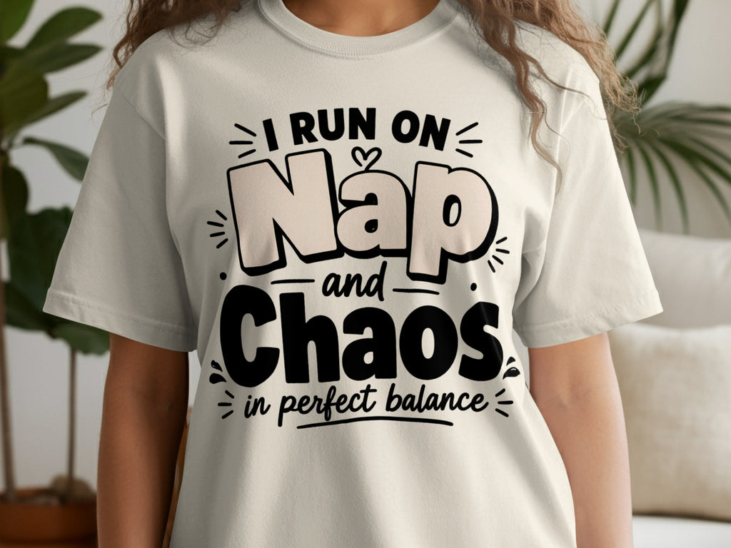 Cream t-shirt with black text "I RUN ON Nap and Chaos in perfect balance."