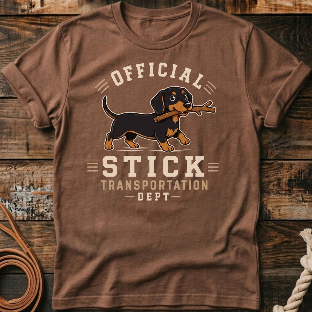 Brown t-shirt with dachshund graphic reading "Official Stick Transportation Dept."
