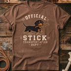 Brown t-shirt with dachshund graphic reading "Official Stick Transportation Dept."