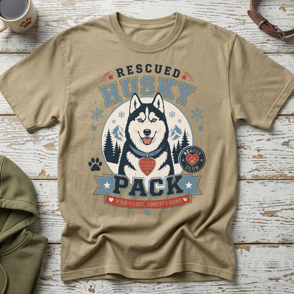 Tan t-shirt with a graphic of a husky, mountains, and text.