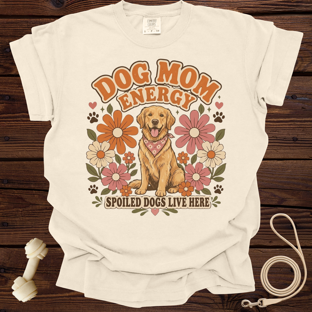 Cream t-shirt with "Dog Mom Energy" text and a golden retriever surrounded by flowers.