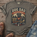Dog Dad Department graphic on a gray t-shirt with dog, leash, ball, and toolbox.