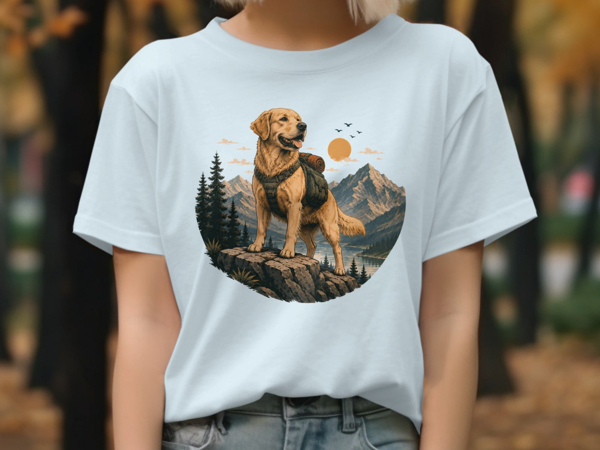 Golden retriever with backpack on cliff overlooking mountains and lake