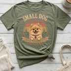 Green t-shirt with Pomeranian dog art and "Small Dog Big Heart" text.