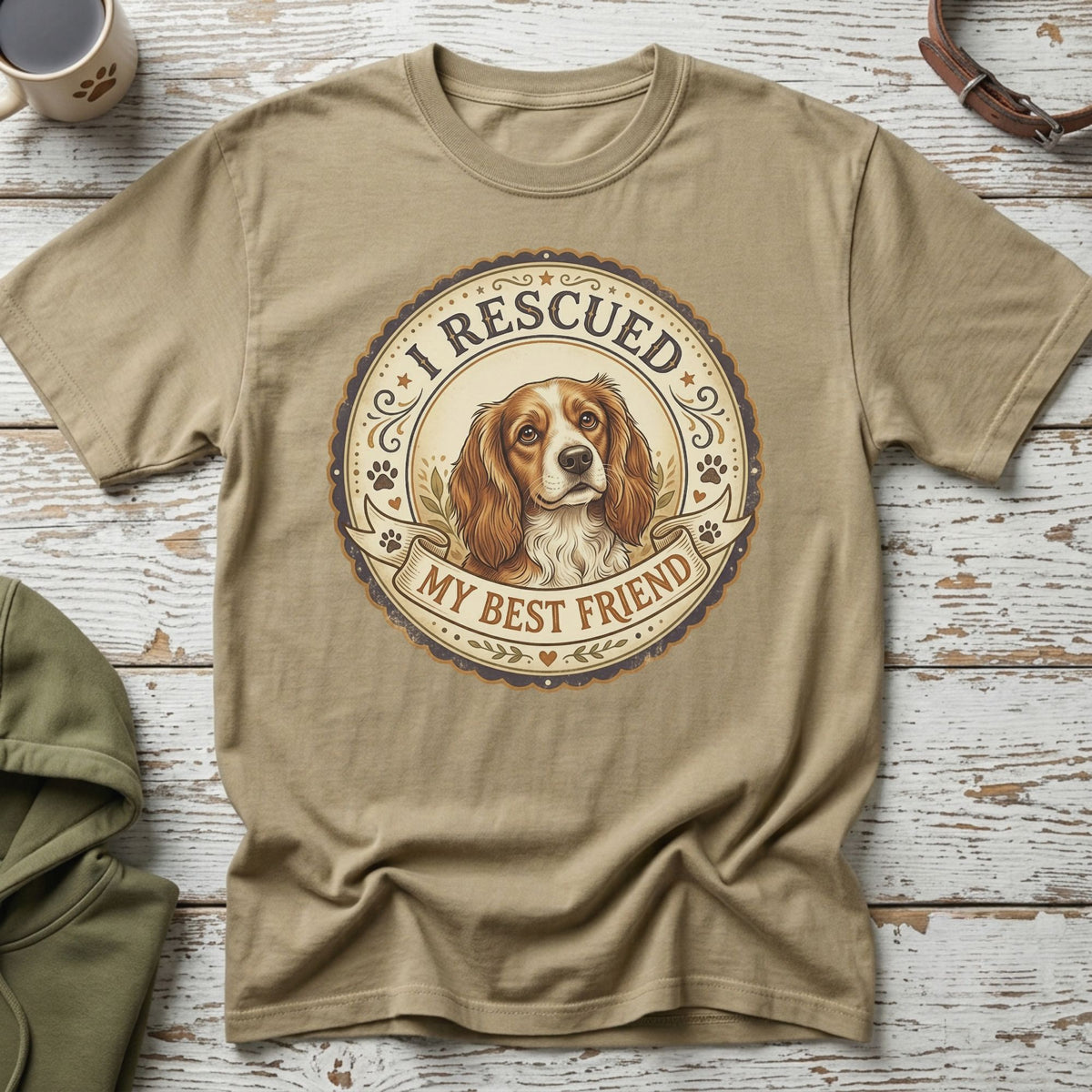 T-shirt with a circular graphic of a dog and text "I RESCUED MY BEST FRIEND".