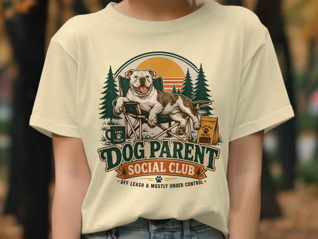 Dog Parent Social Club graphic with dog relaxing in a chair, trees, and sunset.