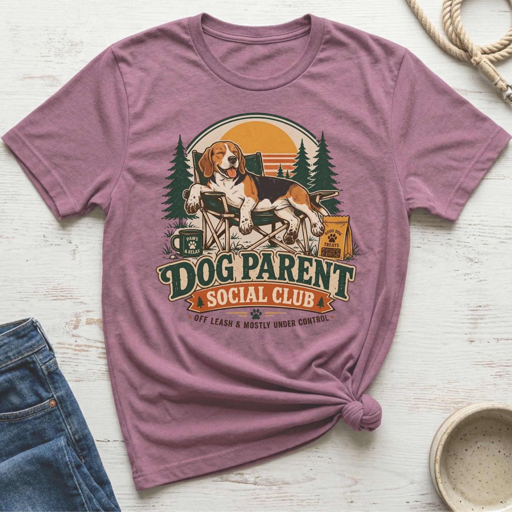 Beagle relaxing in camping chair with "Dog Parent Social Club" text.