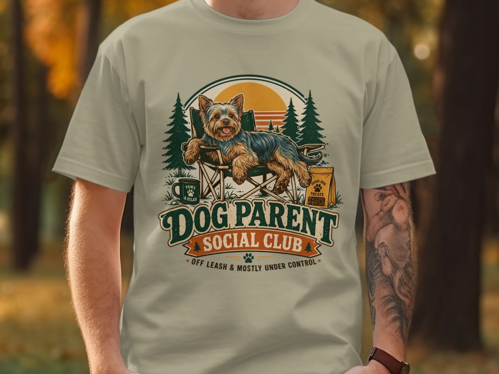 Yorkshire terrier on camping chair with "Dog Parent Social Club" text.