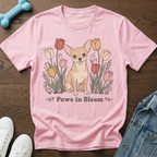 Pink t-shirt with a fawn chihuahua sitting among colorful tulips with "Paws in Bloom" text.